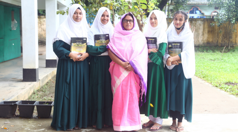 Mrs Mariom Akter (Headmaster, Nadampur High School) with some of her students